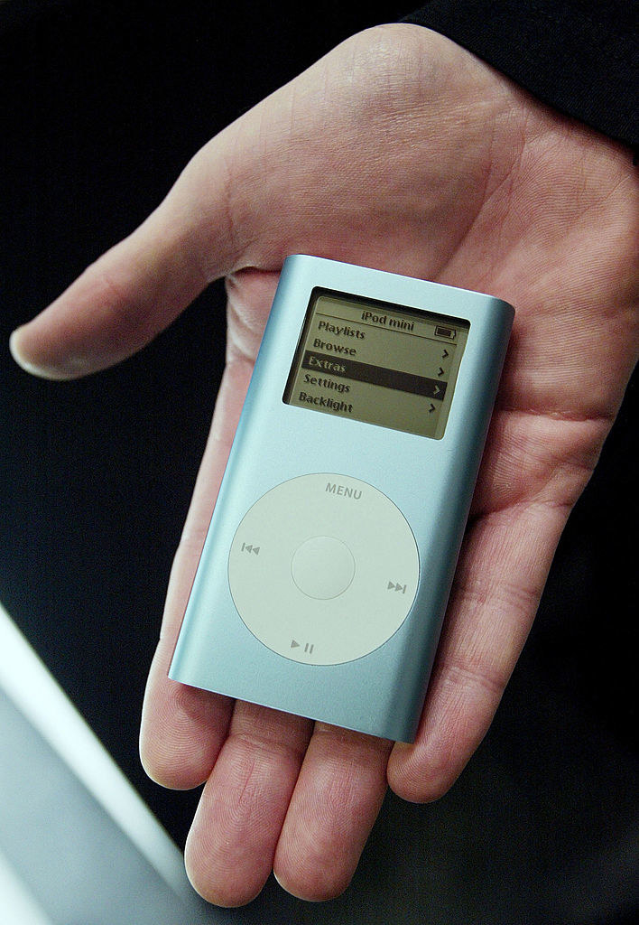 An iPod fitting in the palm of an open hand