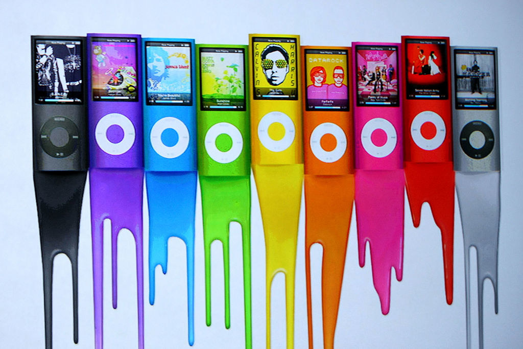 Colorful iPods in a row with their colors appearing to melt