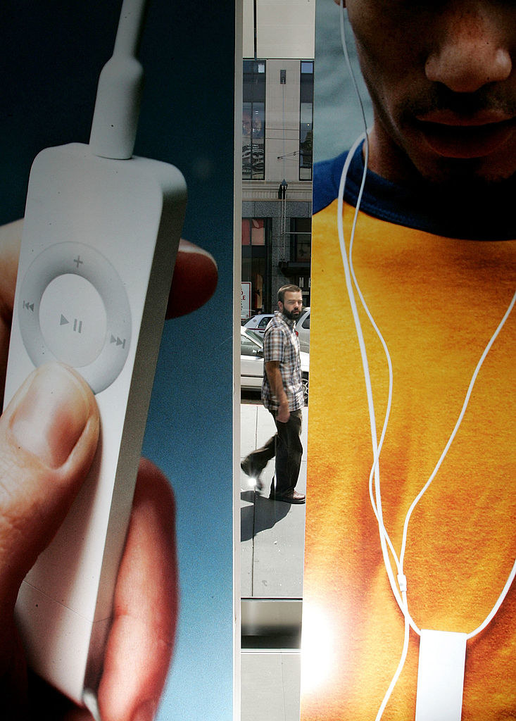 An iPod hanging from someone&#x27;s neck