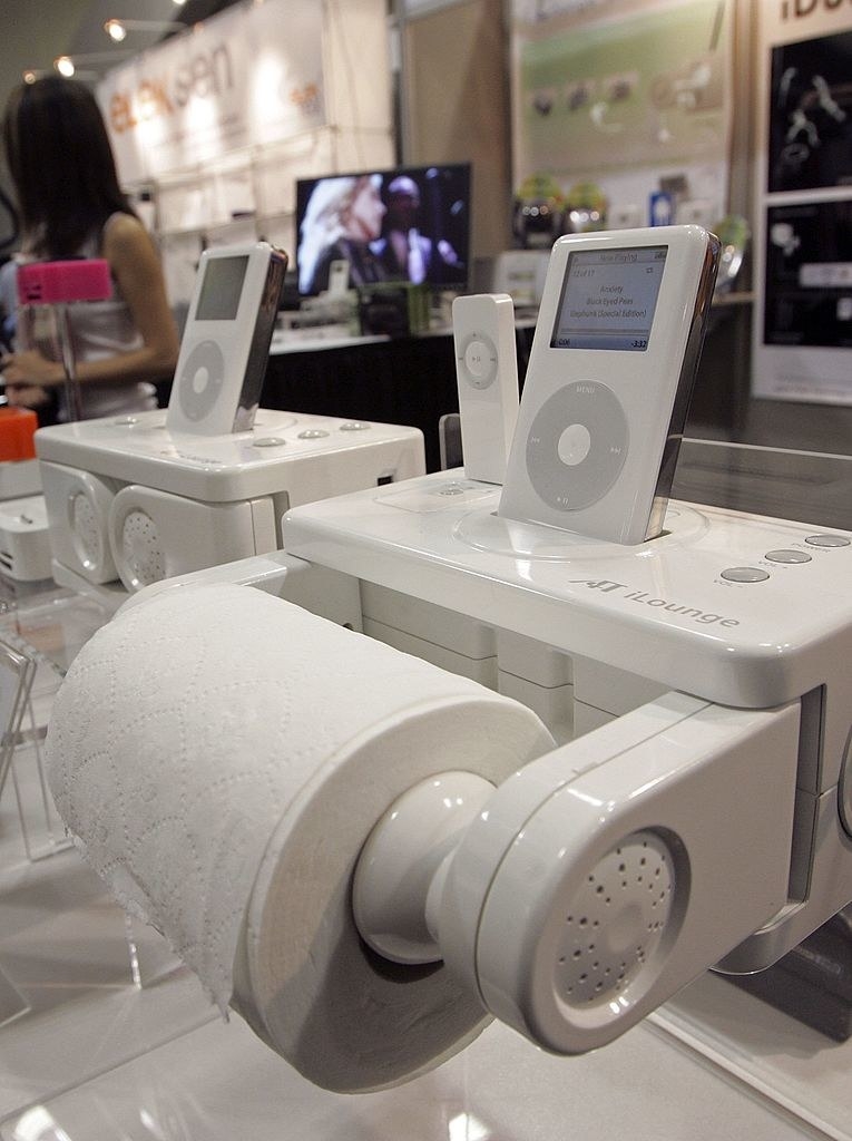 An iPod iLounge  docking station on a toilet tank on display in a store