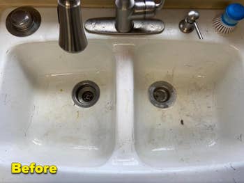a reviewer's sink before using the pink stuff, which is scratched up and dirty
