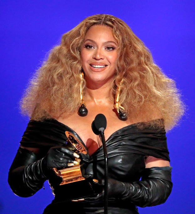 Beyonce smiling while accepting an award