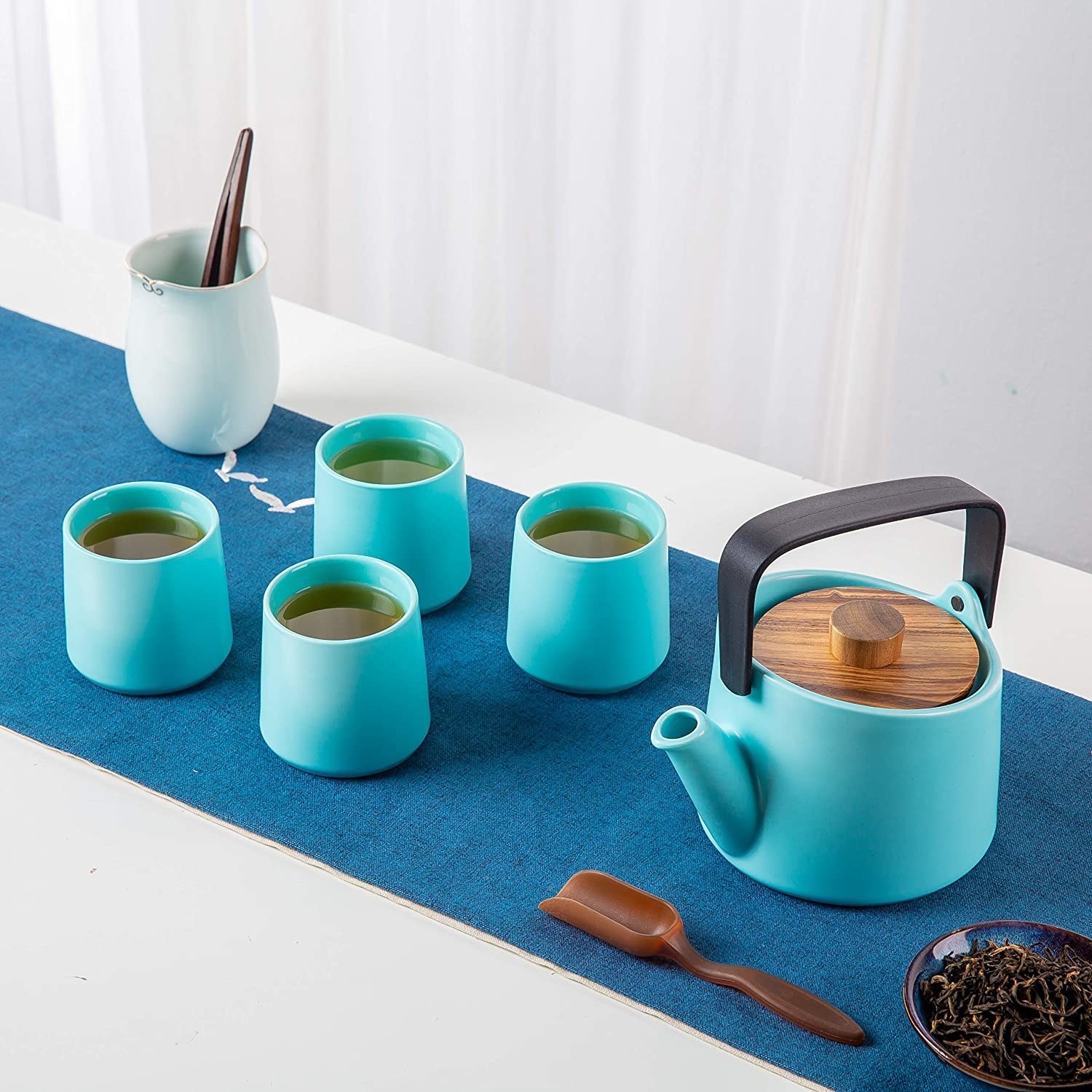 a chic ceramic tea set on a tabletop