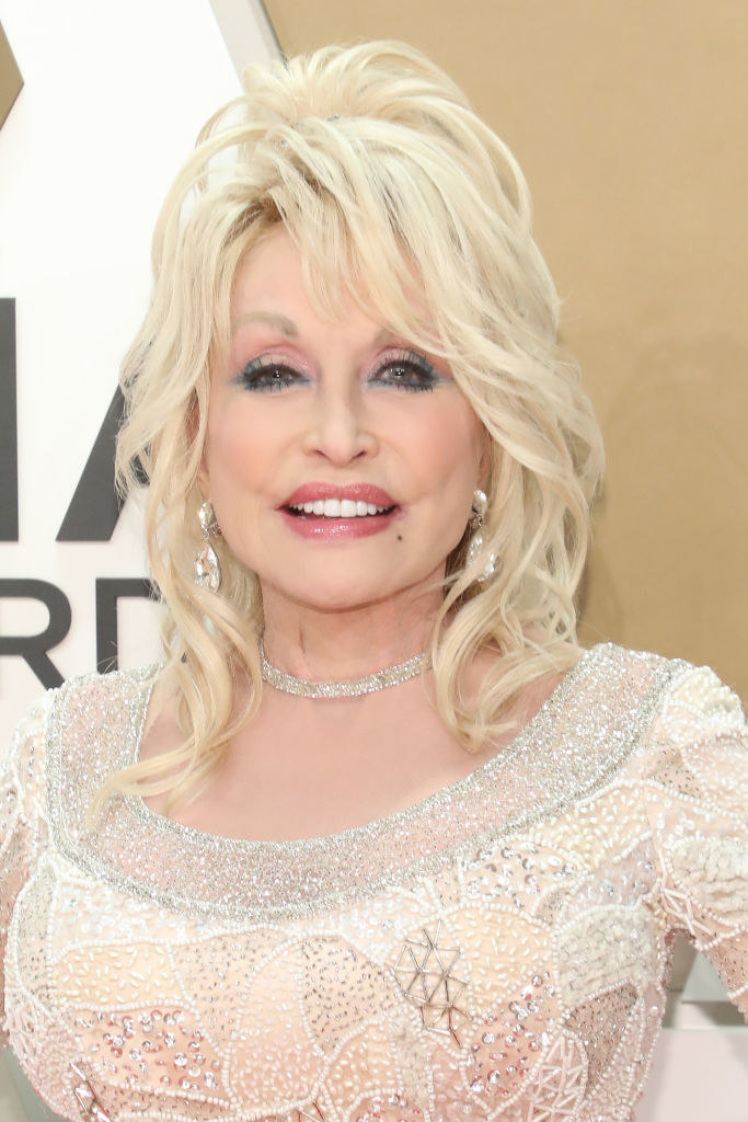 Dolly smiling on a red carpet