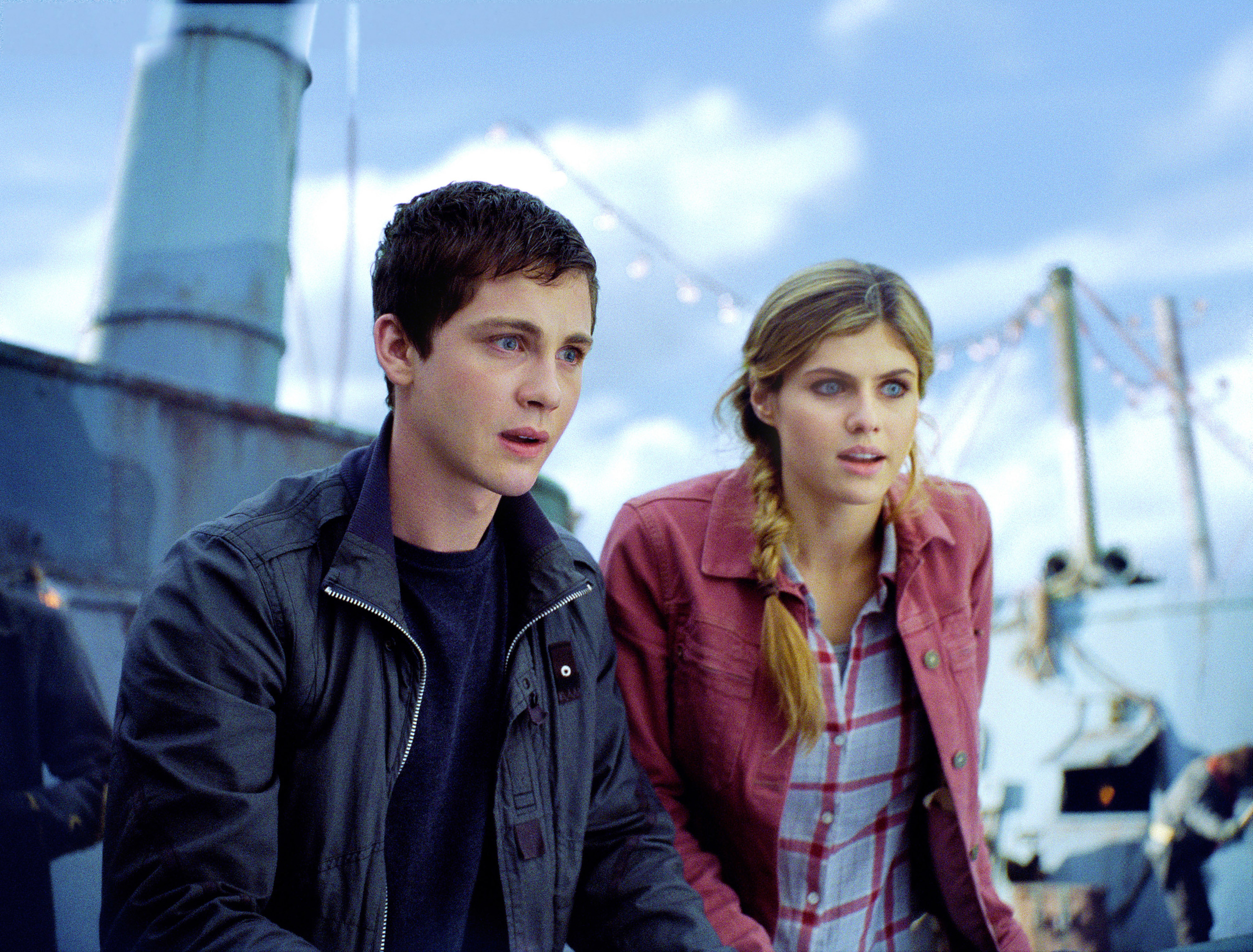 Alexandra in the film standing next to Logan Lerman