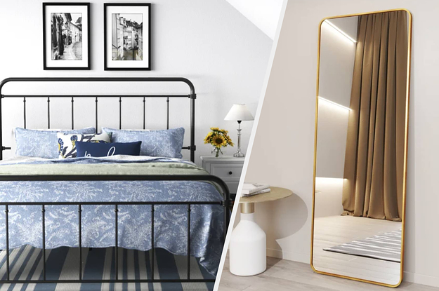 A bed in a room and a mirror against a wall