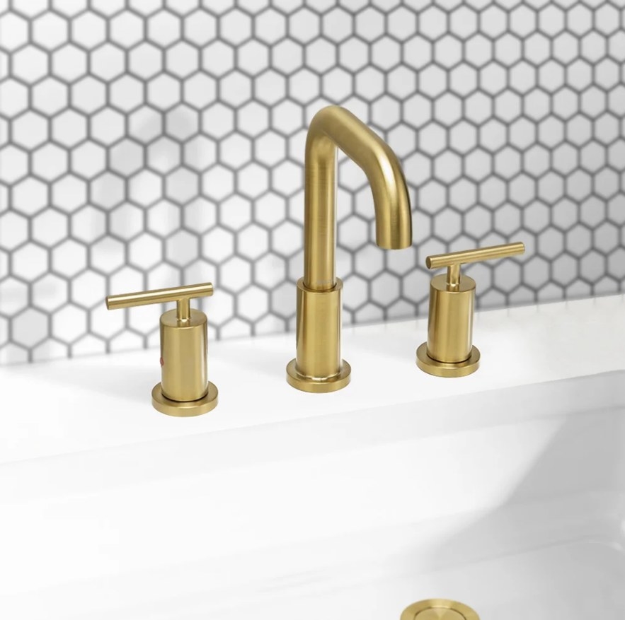 Gold faucet with matching handles and drain