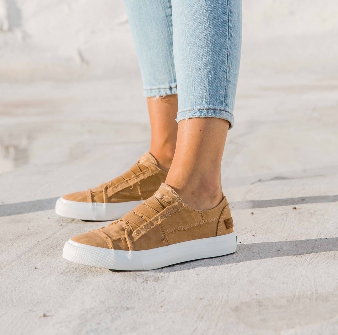 a person wearing the laceless slip-on sneakers