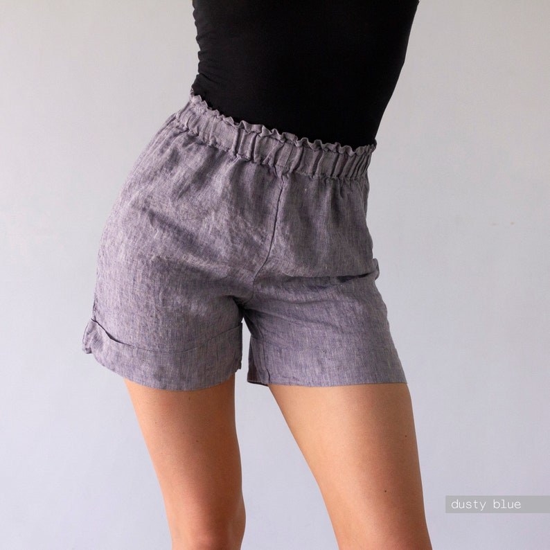 a model wearing the shorts in gray