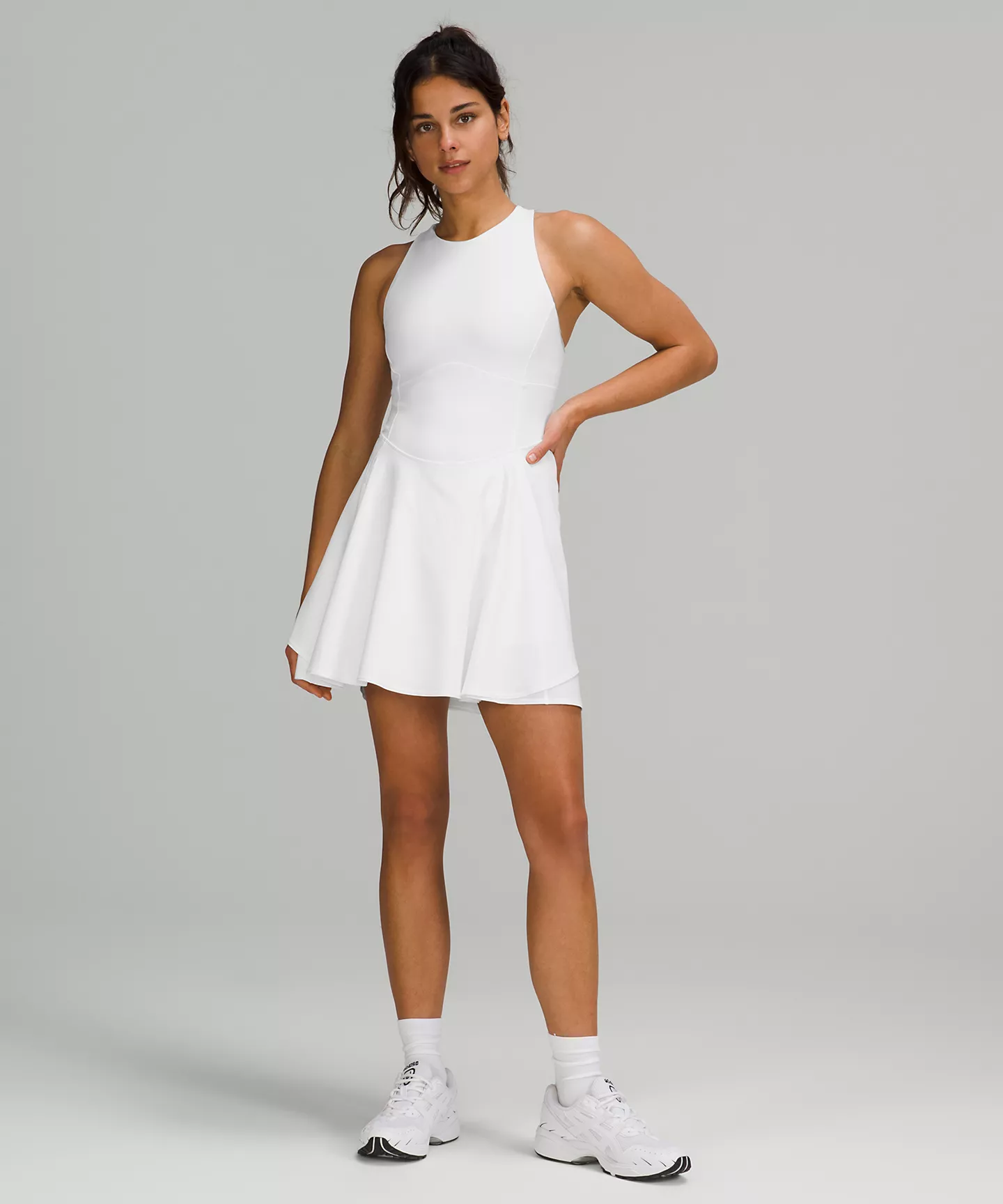 A person wearing a lululemon tennis dress