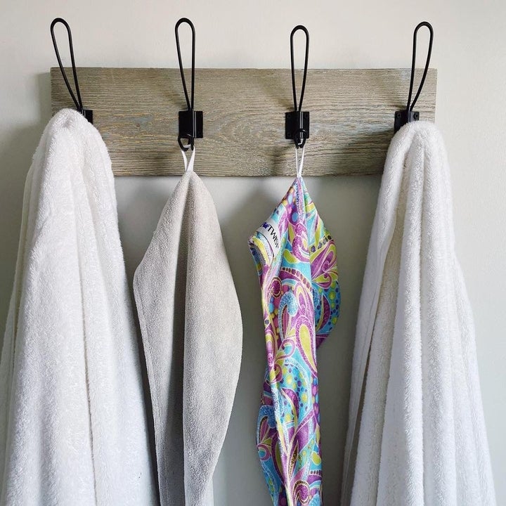 The Turbie Twist, hanging on a towel hook
