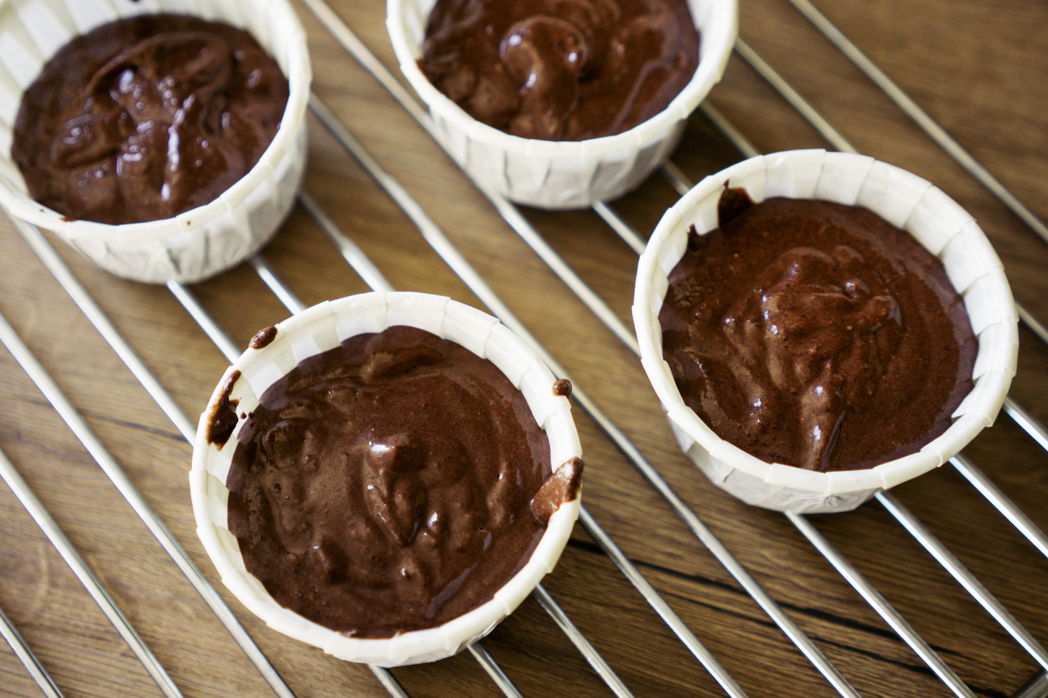 Chocolate batter in cupcake holders