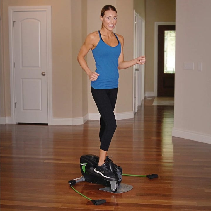 A model using the elliptical while standing up