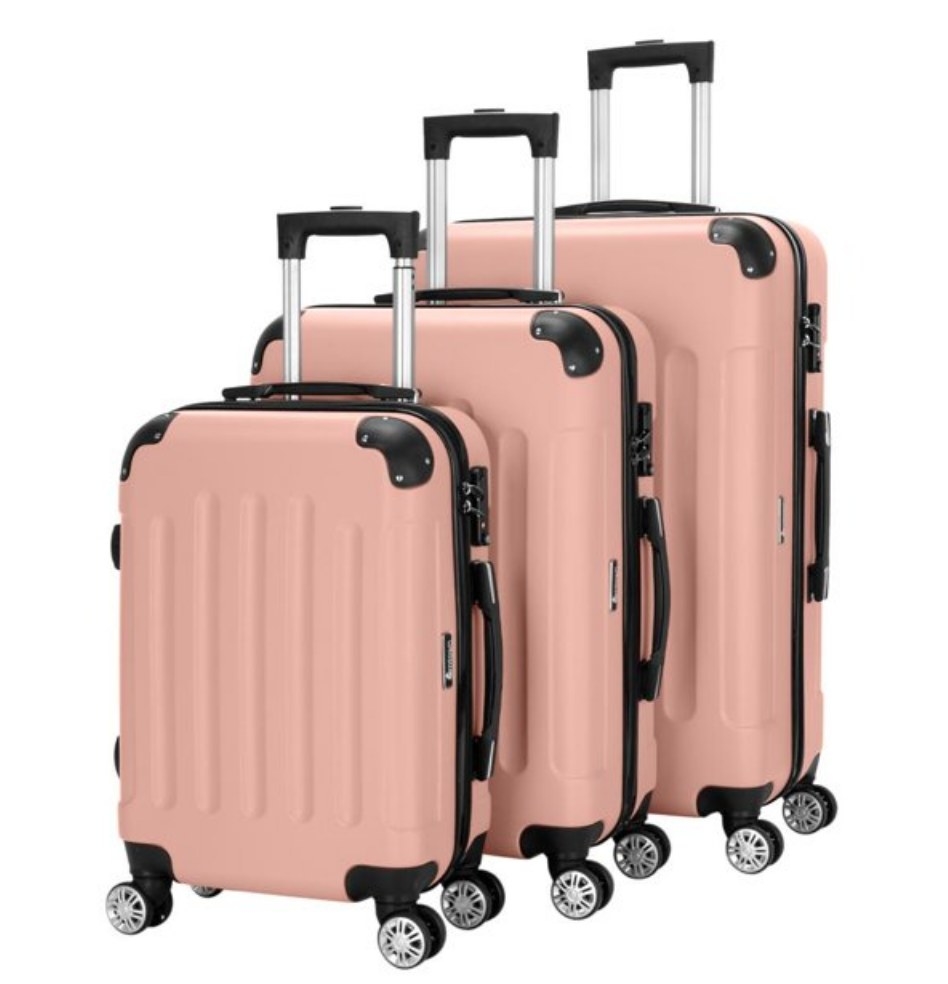 A rose gold 3 piece luggage set