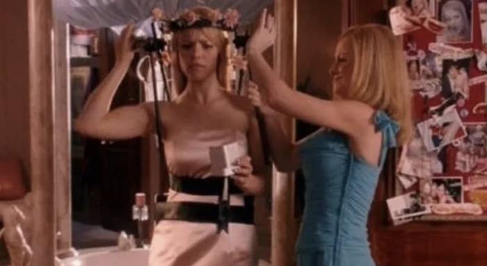 Amy helping Rachel with her back brace