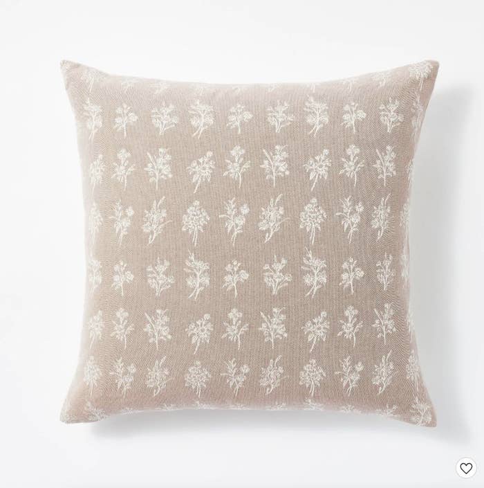 Woven pillow with floral design