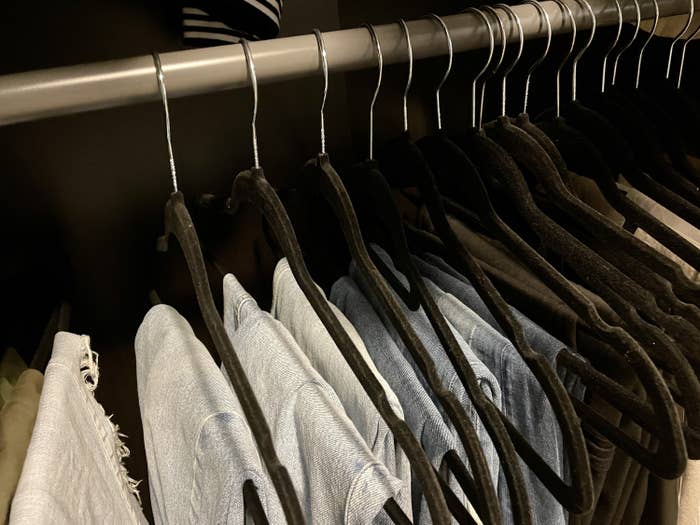 May&#x27;s jeans organized on the hangers on a rack