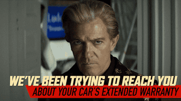 Antonio Banderas putting a phone up to his ear with the words, &quot;We&#x27;ve been trying to reach you about your car&#x27;s extended warranty&quot;