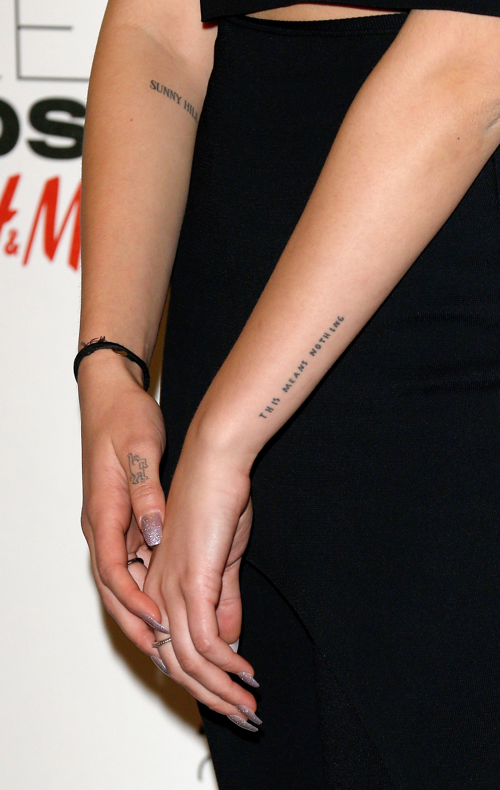 Kehlani Spanish Writing Neck Tattoo  Steal Her Style