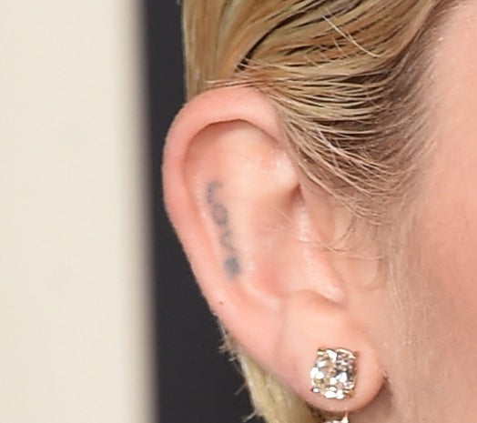 A closeup of Miley&#x27;s tattoo, which is small and on the inside of her ear