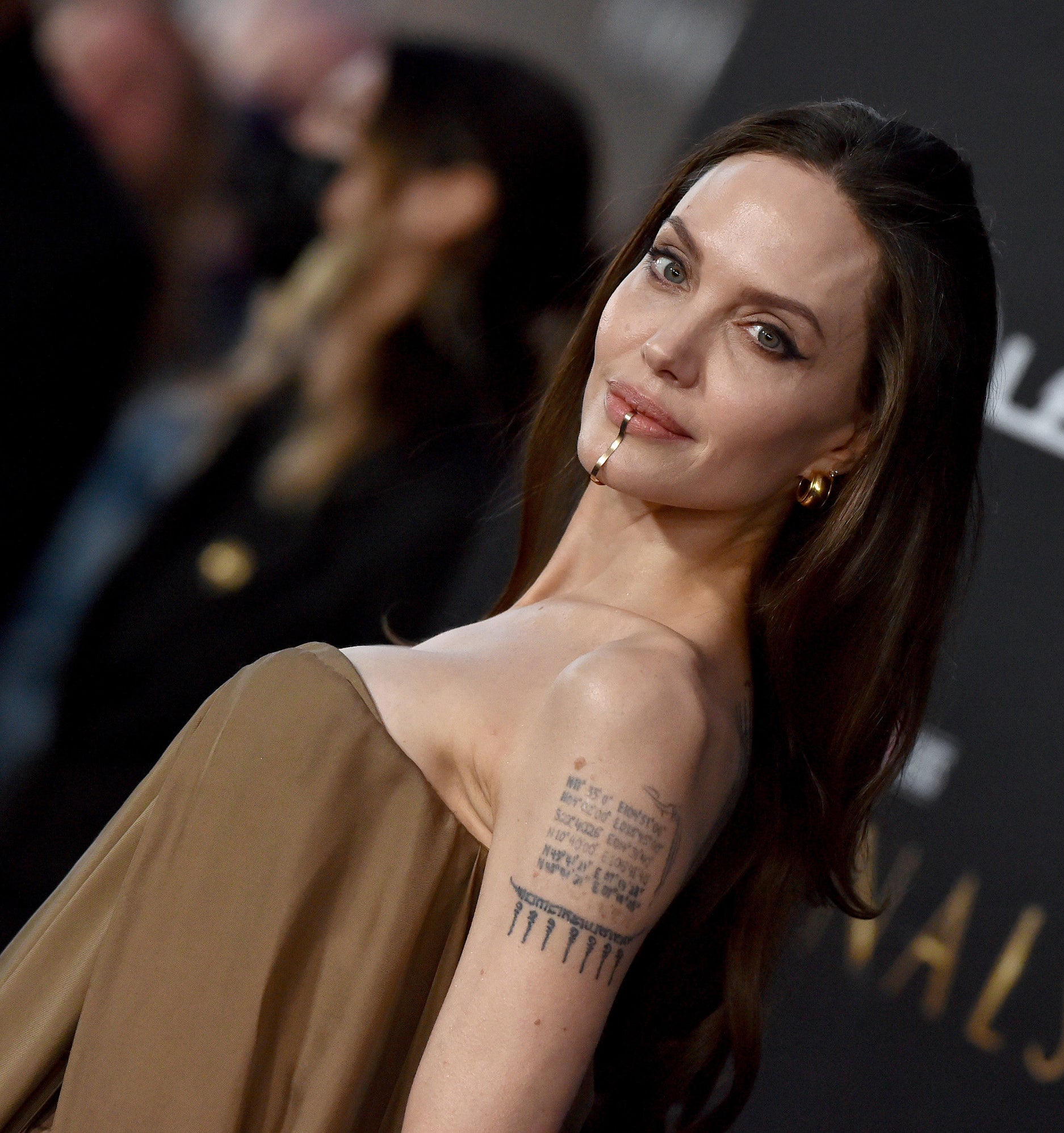 Angelina&#x27;s tattoo near her shoulder has six different coordinates listed