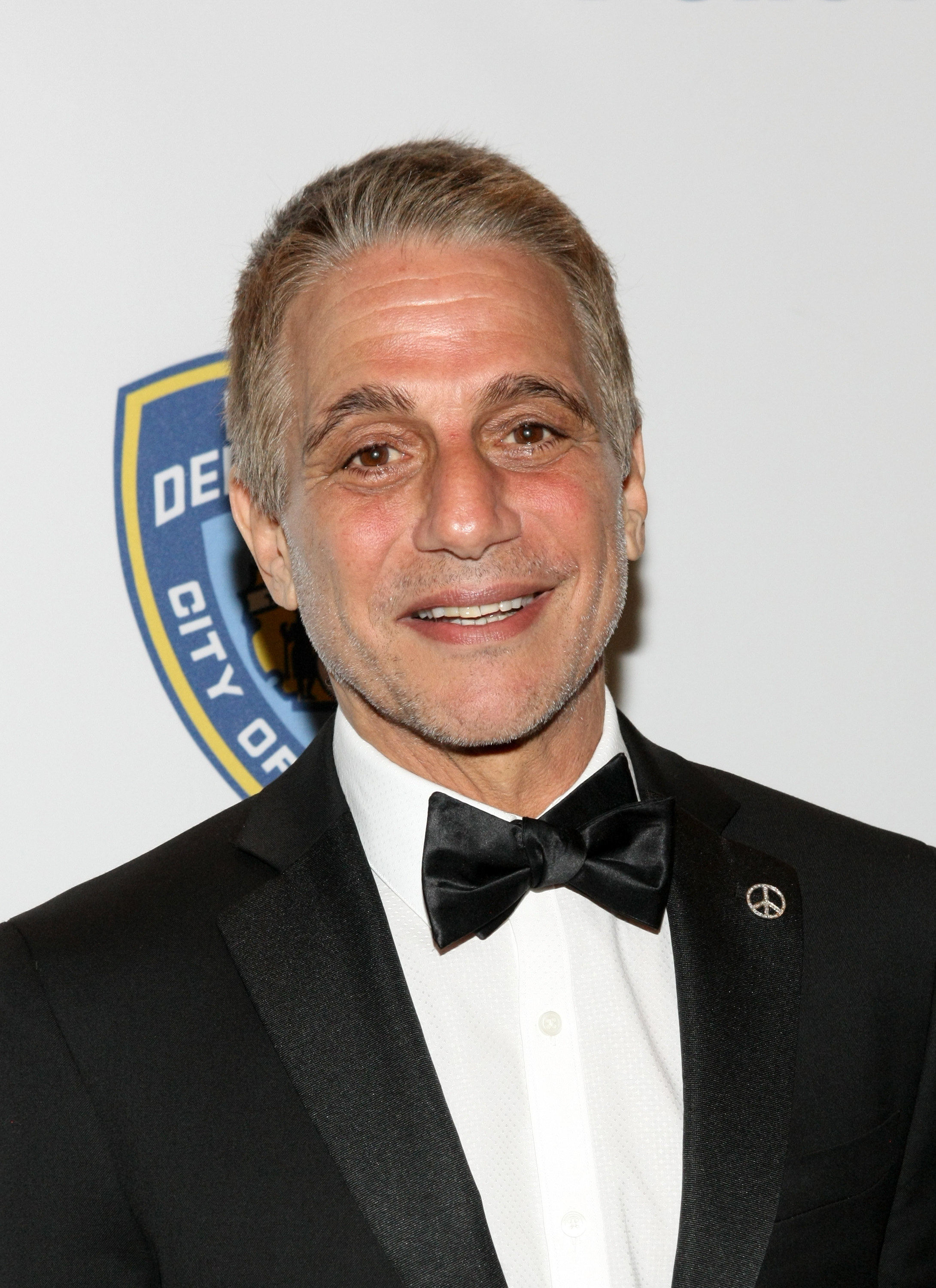 Tony Danza wears a tux and smiles