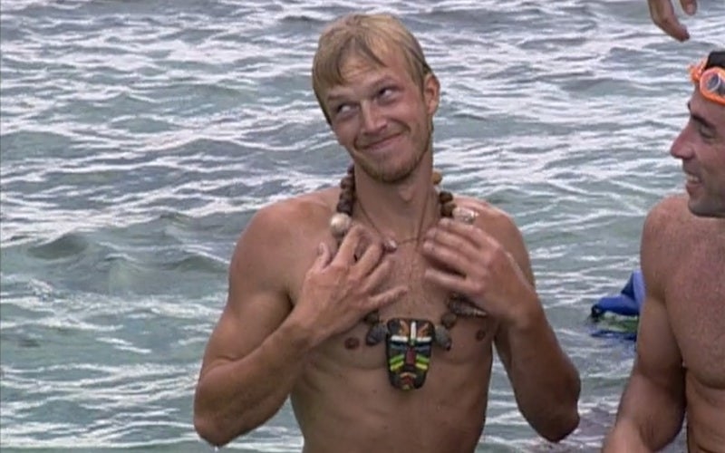Greg Buis wears the immunity necklace