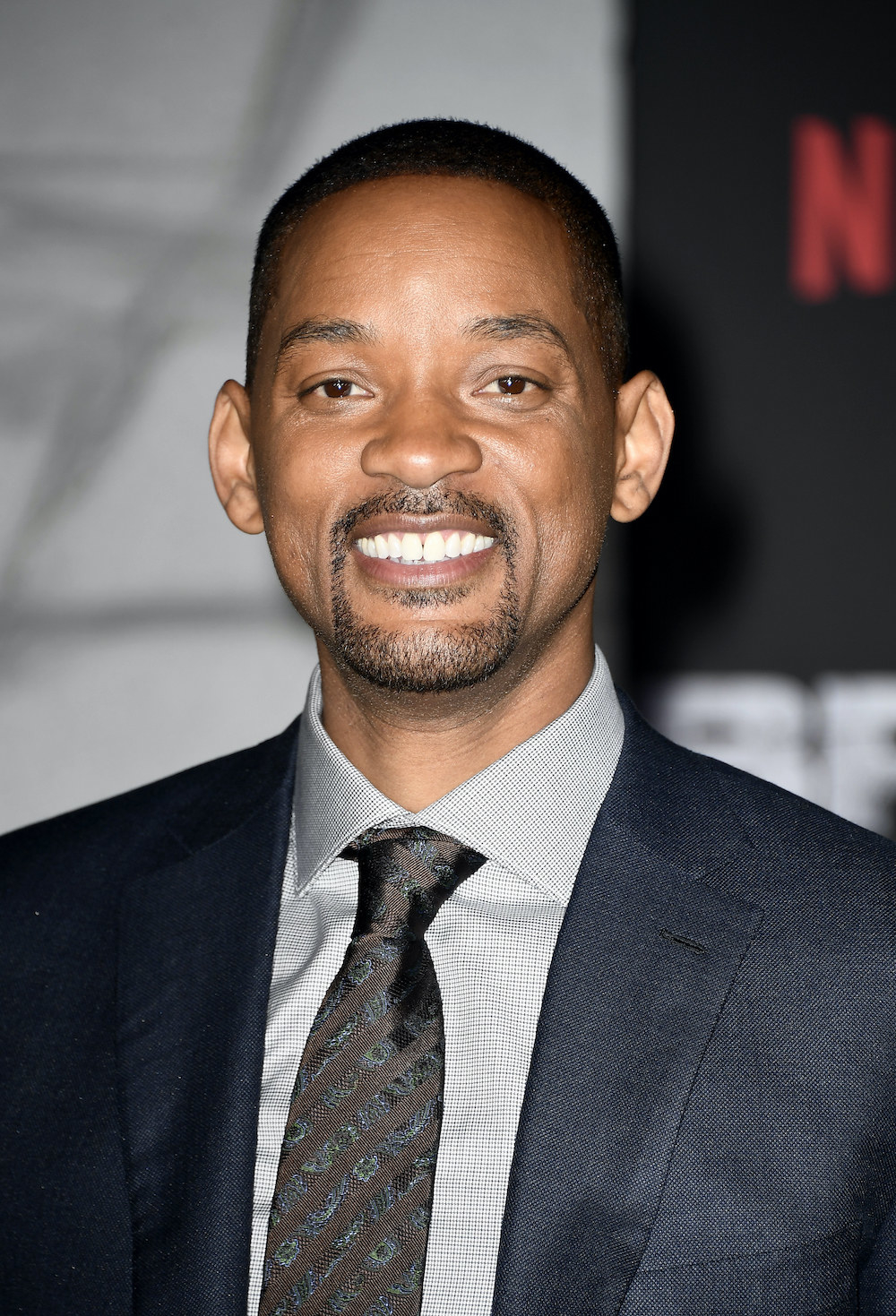 A closeup of Will Smith smiling