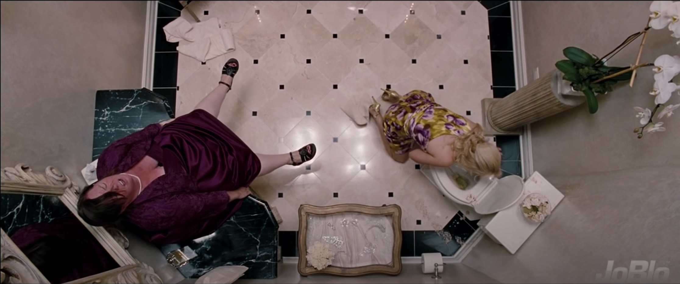People suffering from food poisoning in the bathroom in &quot;Bridesmaids&quot;