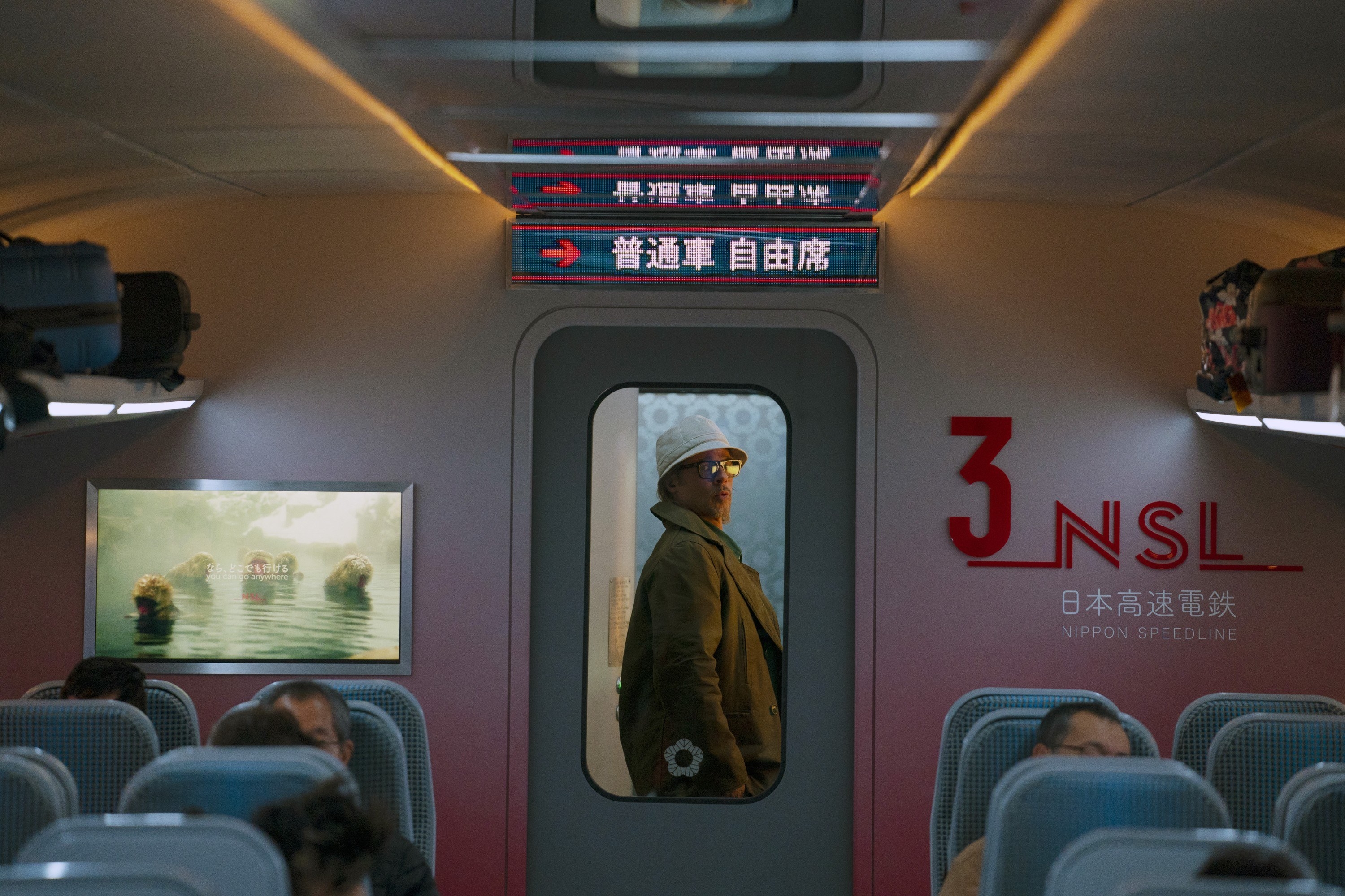 a man looks into the car of a train
