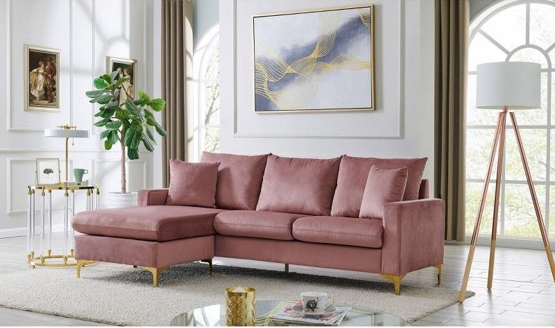 the pink couch in a living room