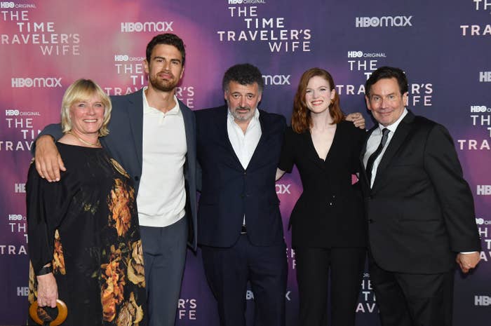 the cast posing on the red carpet