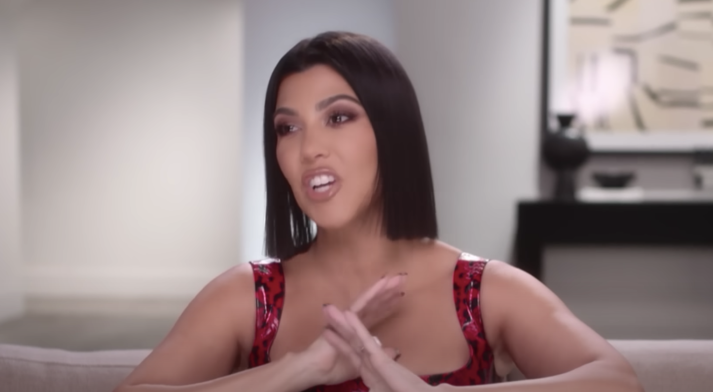 Kourt talking in her confessional