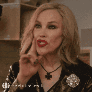 Catherine O&#x27;Hara Moira Rose holds a finger to her lip and shushes in &quot;Schitt&#x27;s Creek&quot;