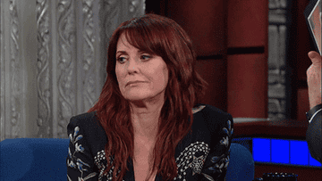 Megan Mullally sticks her tongue out and pretends to vomit in &quot;The Late Show with Stephen Colbert&quot;