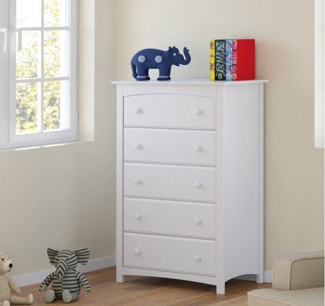 The dresser in white in a child&#x27;s room