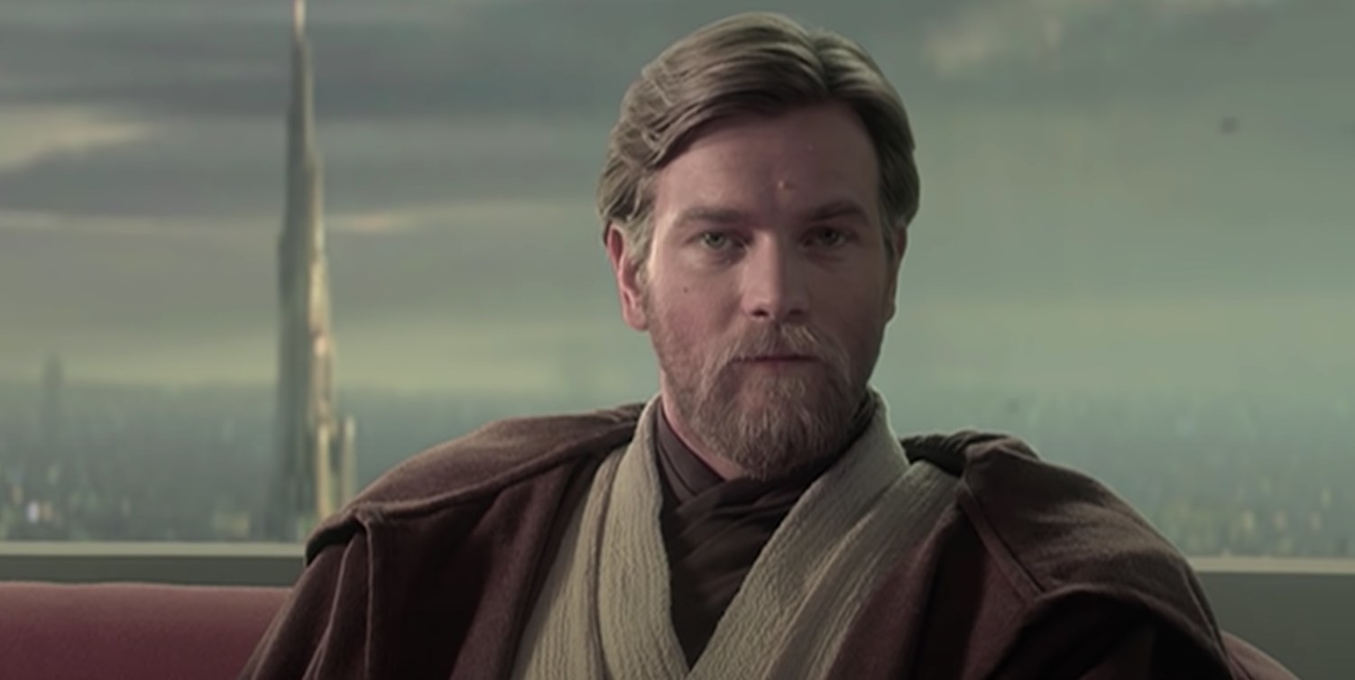 Younger Obi-Wan Kenobi sitting in Jedi outfit