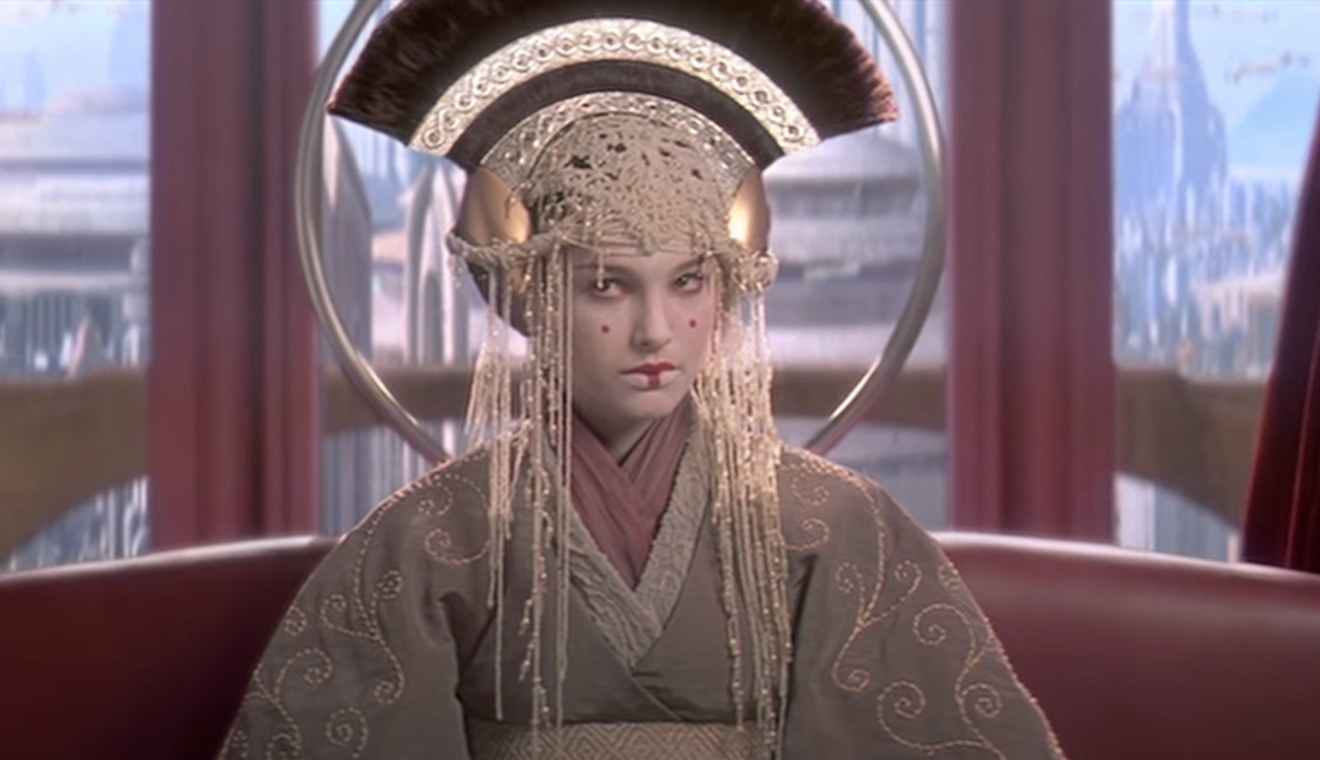 The Queen in Phantom Menace, dressed in an excuberant headpiece