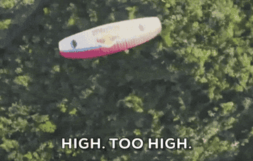 Person parasailing and saying &quot;high too high&quot;