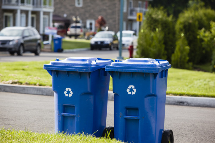Recycling bins on a street curb