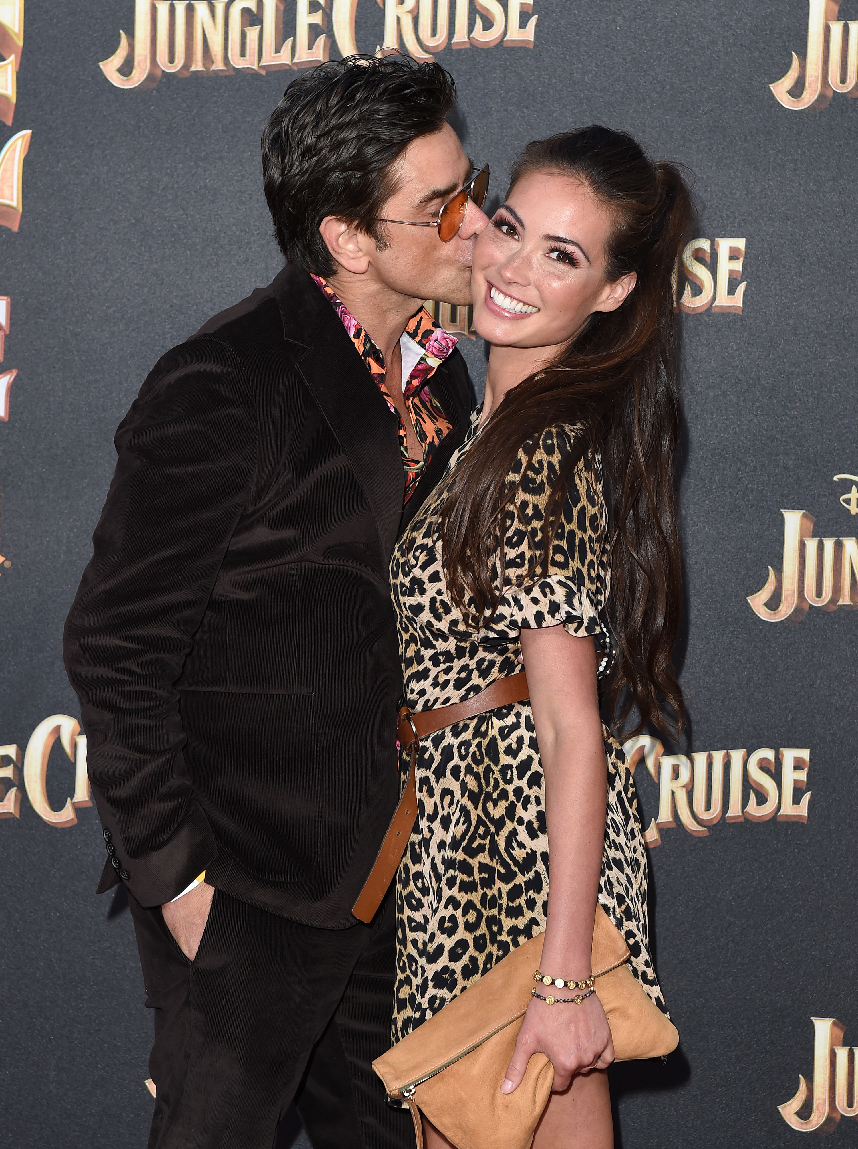 John Stamos and Caitlin McHugh on the red carpet