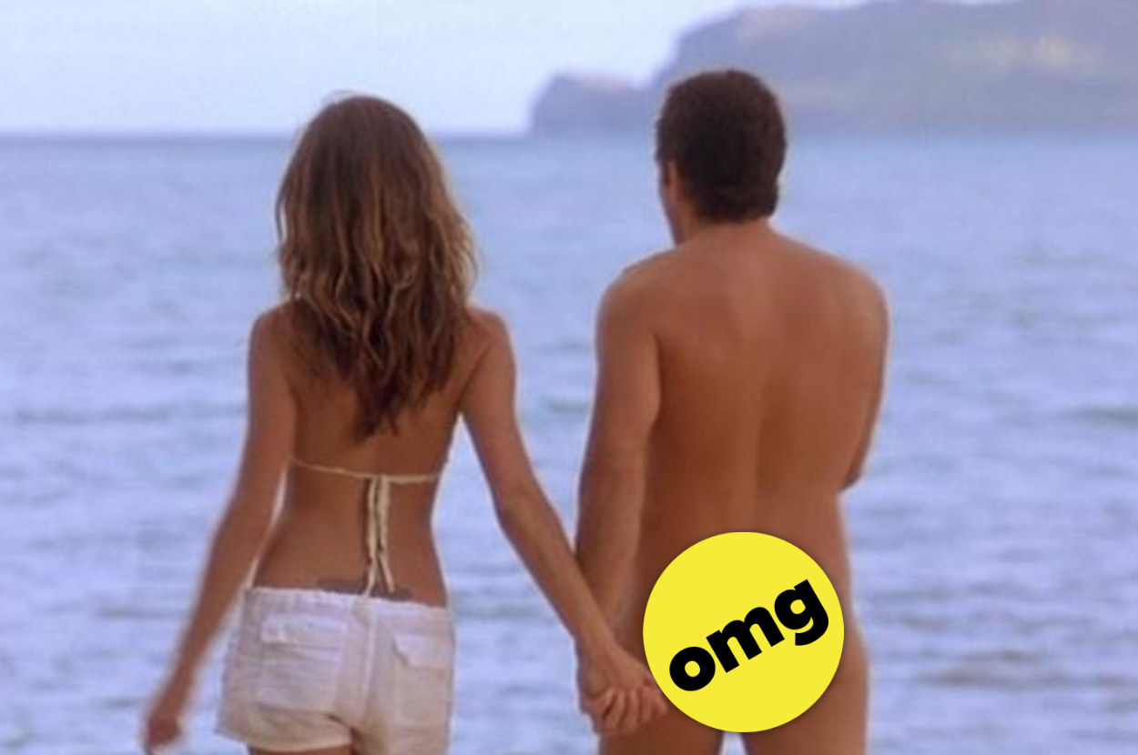 Adam Sandler holding hands with a woman at a beach and standing nude