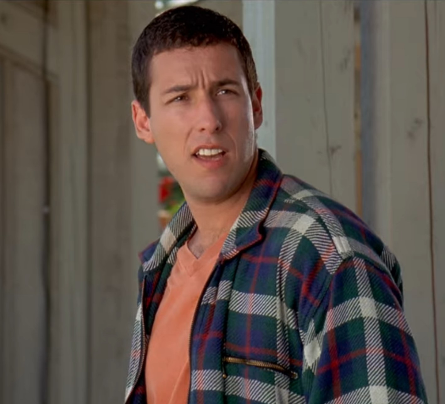 Adam Sandler as Happy Gilmore stands outside his grandma&#x27;s house