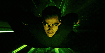 Keanu Reeves as Neo flying through The Matrix