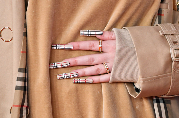 a girl with burberry nails