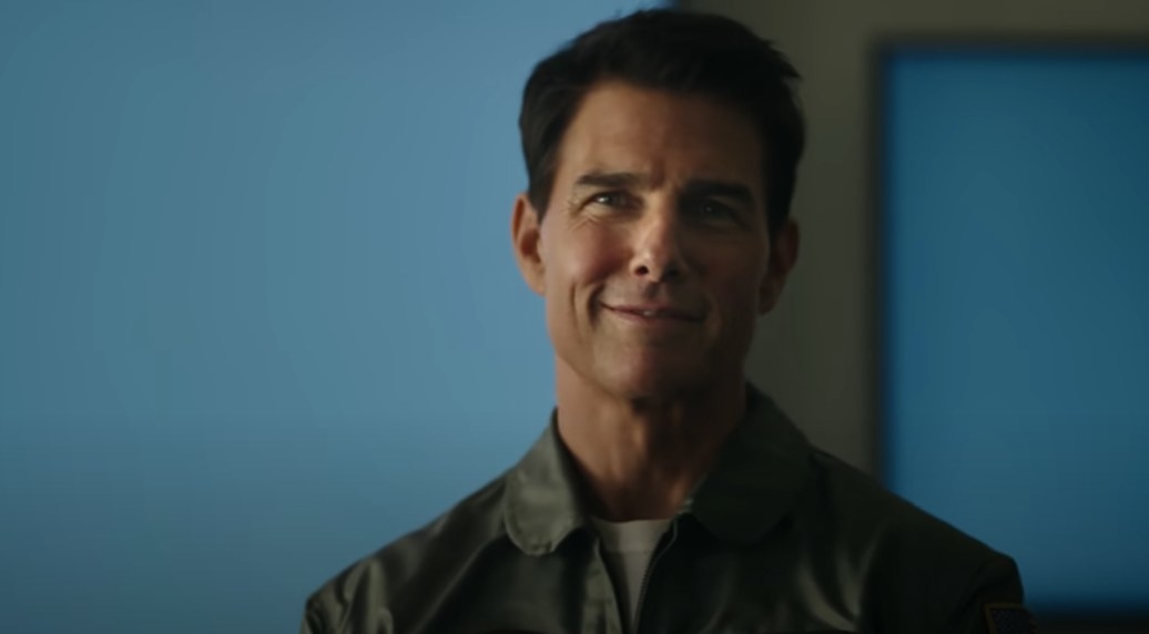 Tom Cruise smirking as Maverick