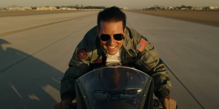 Tom Cruise riding a motorbike in new Top Gun Maverick movie