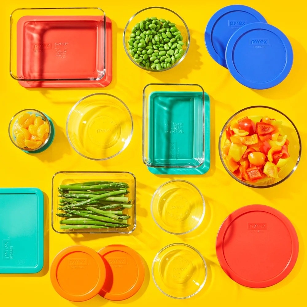 a nine-piece container food storage set with orange and blue lids