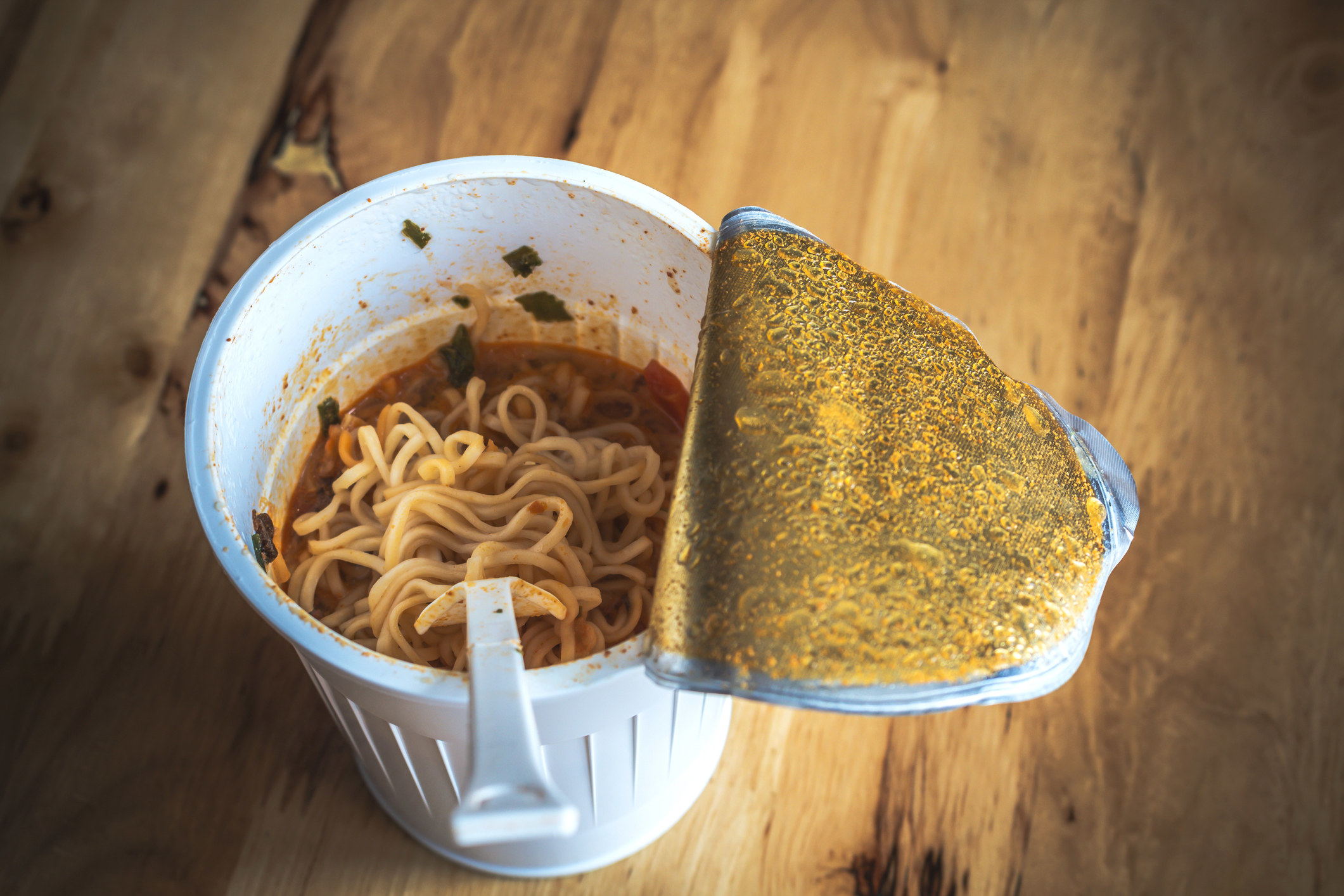 Cooked instant cup ramen noodles