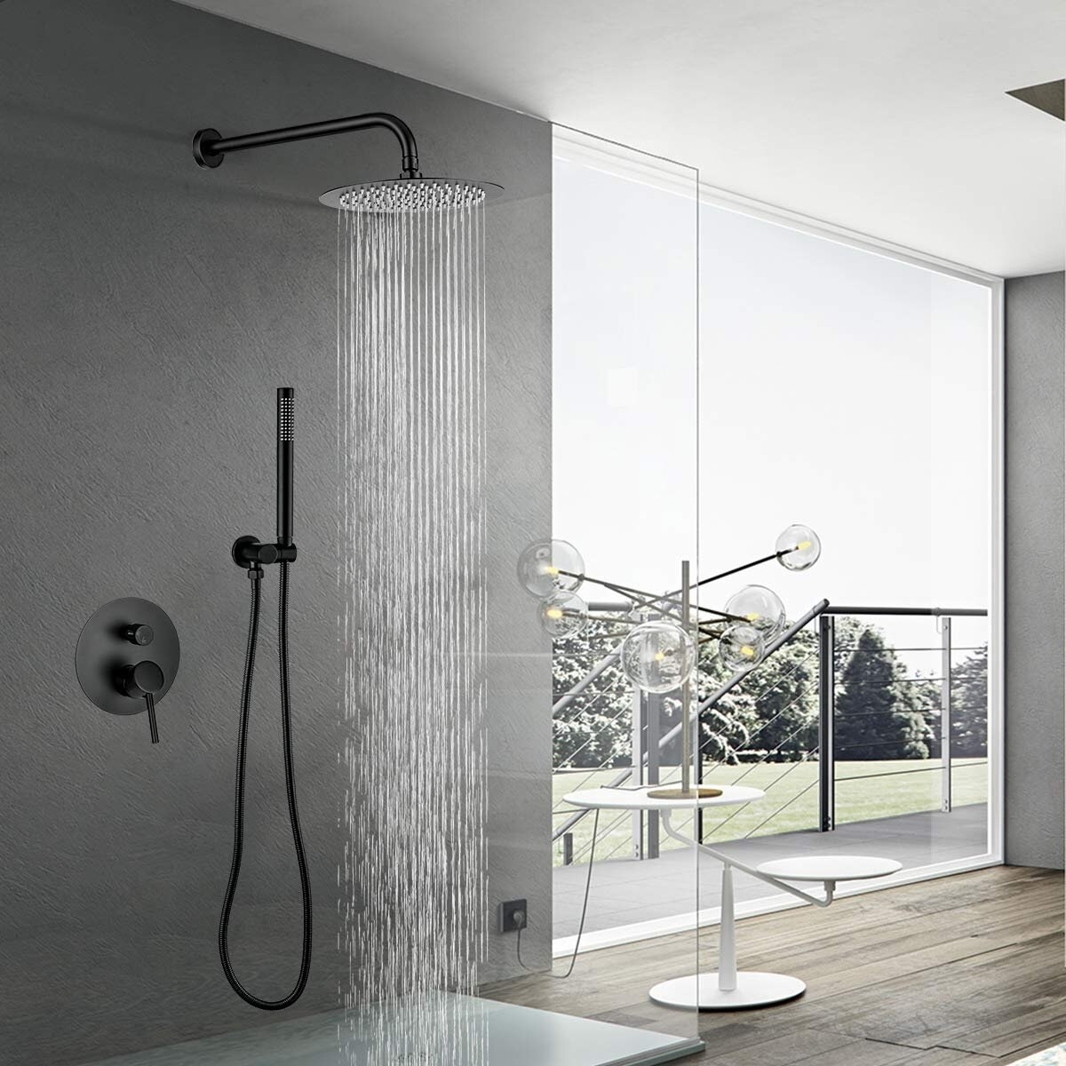 the black shower head with water pouring out